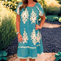 Robe féminine Élégante avec Motifs - Coupe ample, Manches courtes, Longueur genou