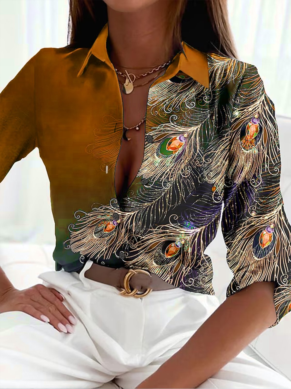 Élégant chemisier pour femmes avec un magnifique imprimé de plumes de paon - top stylé et à la mode