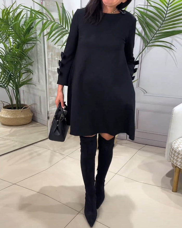 Robe Femme Élégante à Coupe A, Manches Longues avec Détail Nœud, Longueur Genoux et Col Rond