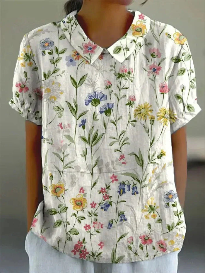 Elégant top pour femmes avec de belles broderies florales - manches courtes élégantes pour un look décontracté