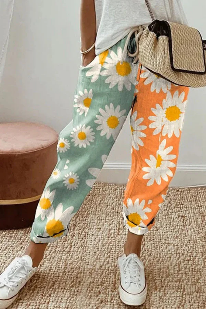 Élégant pantalon décontracté pour femmes avec un imprimé floral accrocheur - un vêtement d'intérieur confortable et aéré pour tous les jours