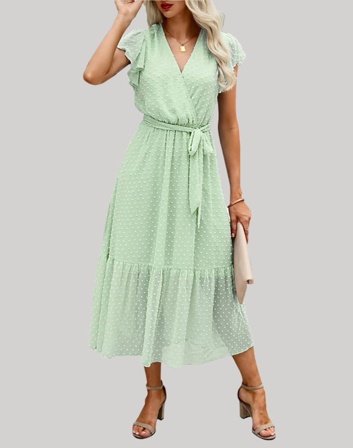 Robe féminine évasée avec col en V, manches courtes bouffantes et ourlet à volants - Style décontracté et élégant