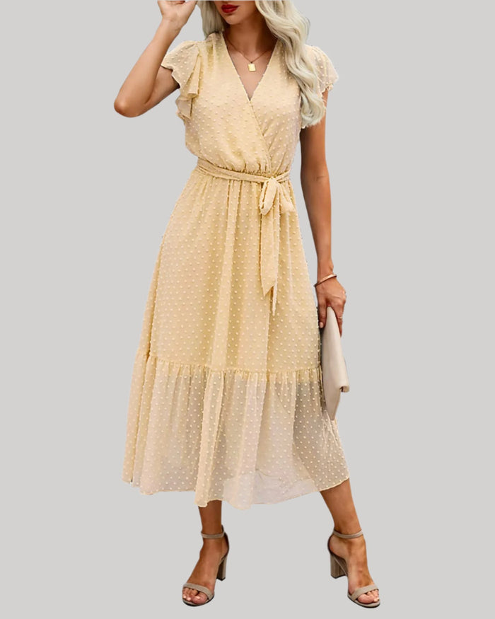 Robe féminine évasée avec col en V, manches courtes bouffantes et ourlet à volants - Style décontracté et élégant