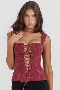 Élégant top corset à lacets pour femme, de couleur merlot, pour un look sophistiqué.