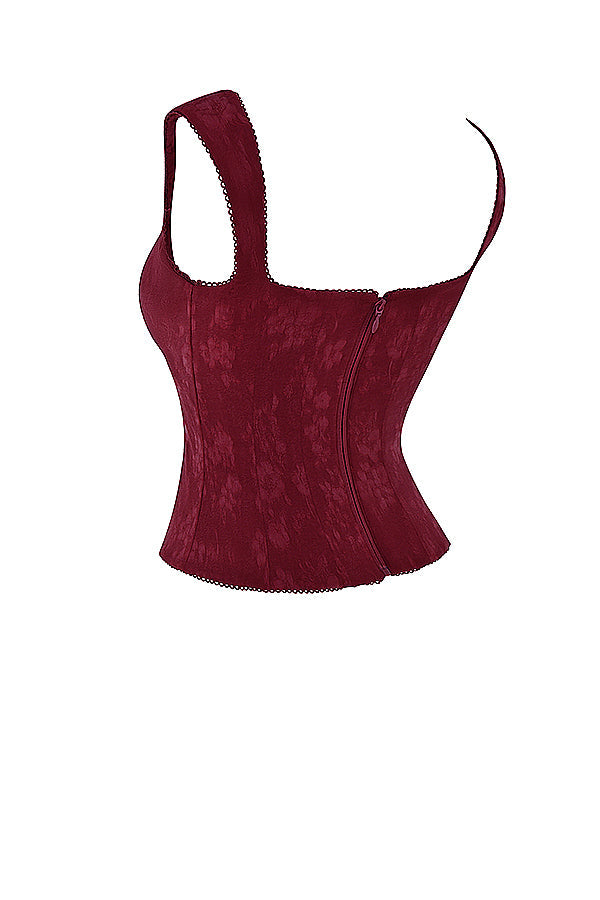 Élégant top corset à lacets pour femme, de couleur merlot, pour un look sophistiqué.
