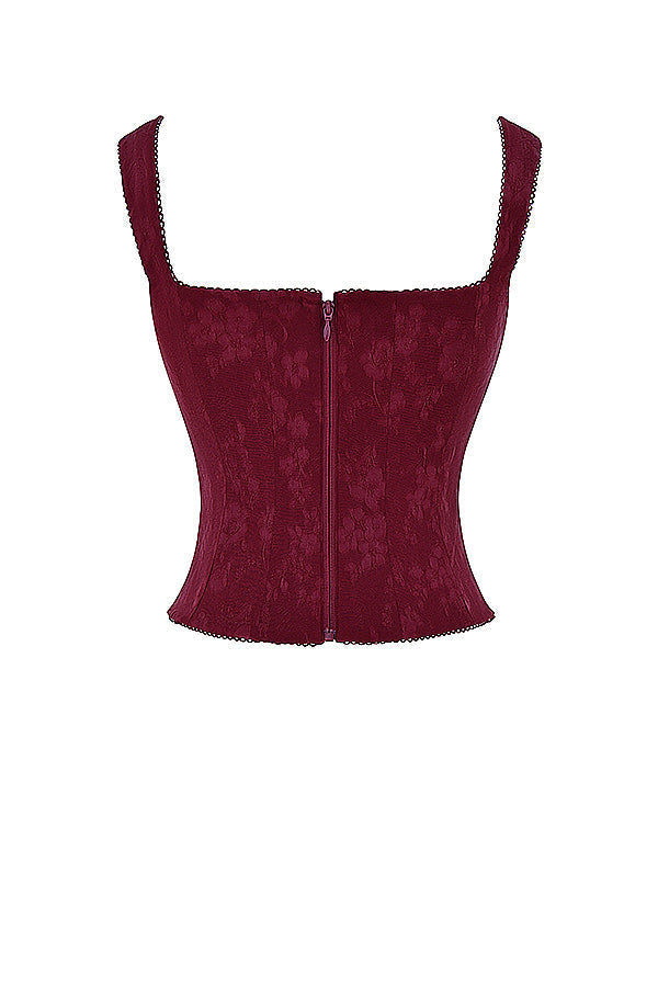 Élégant top corset à lacets pour femme, de couleur merlot, pour un look sophistiqué.