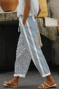 Élégant pantalon décontracté pour femmes avec un imprimé floral accrocheur - un vêtement d'intérieur confortable et aéré pour tous les jours