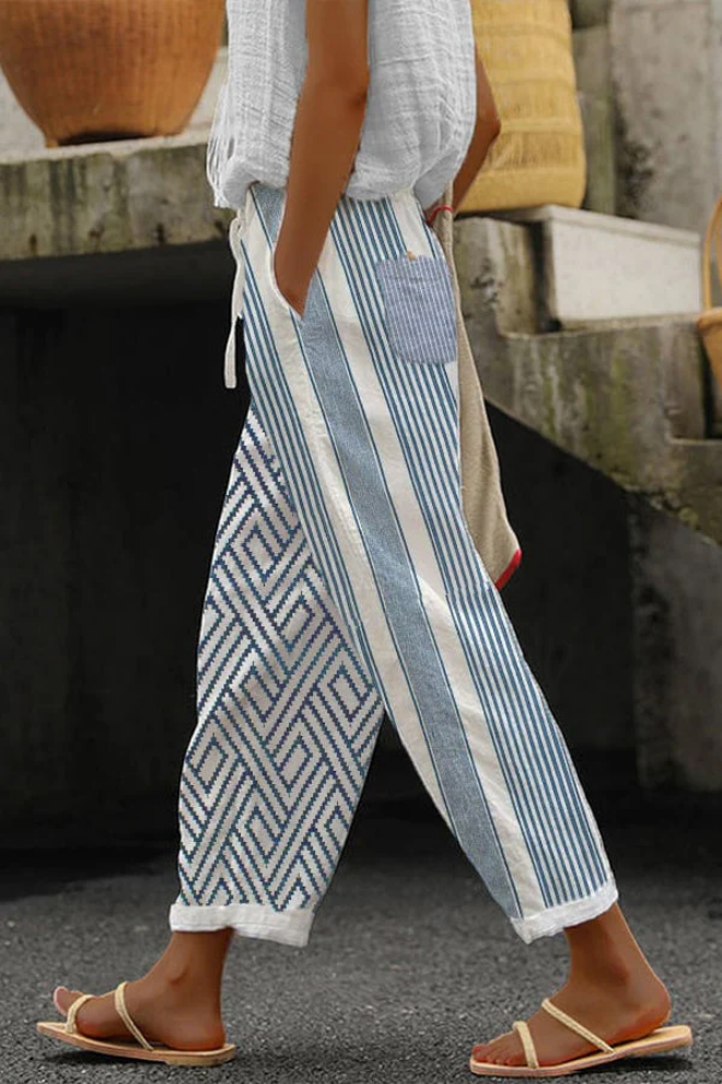 Élégant pantalon décontracté pour femmes avec un imprimé floral accrocheur - un vêtement d'intérieur confortable et aéré pour tous les jours